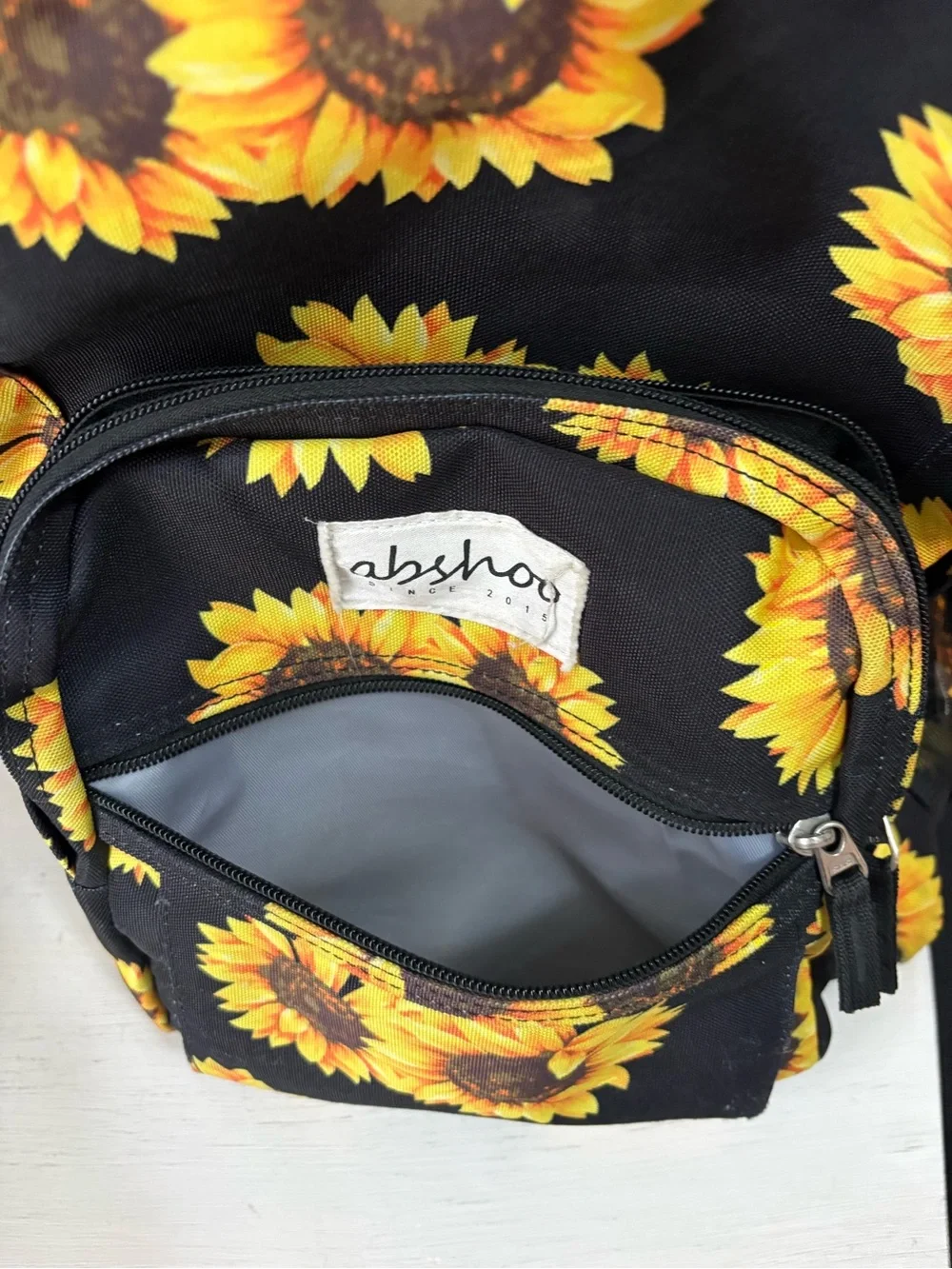 Abshoo Black Kids Backpack with Sunflower Print